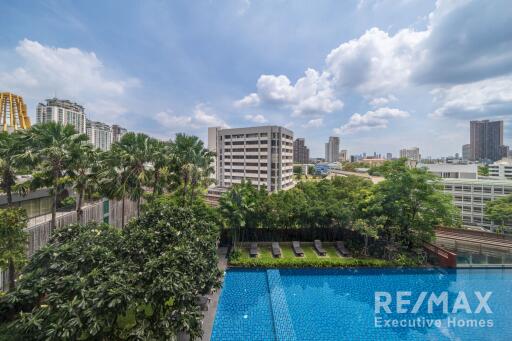 View of a pool in an urban apartment complex