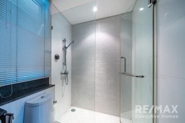 modern bathroom with glass shower enclosure