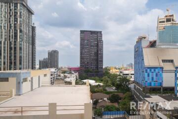 View of city buildings from a high-rise apartment