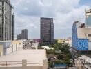 View of city buildings from a high-rise apartment