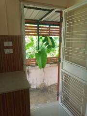 Kitchen with a door leading to an outdoor space