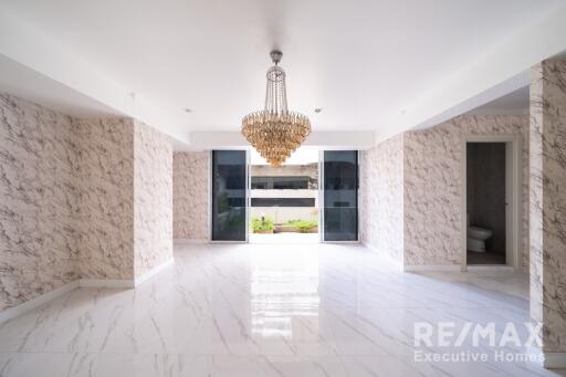 Spacious living room with chandelier