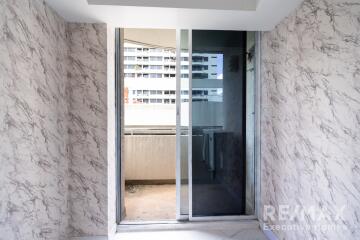 View of the balcony with sliding glass door