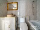 Modern bathroom with large mirror and bathtub