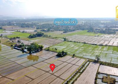 Aerial view of farmland with plots marked