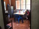 Dining area with table and chairs