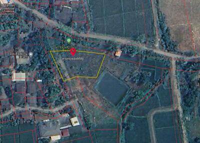 aerial view of a land plot with surrounding areas