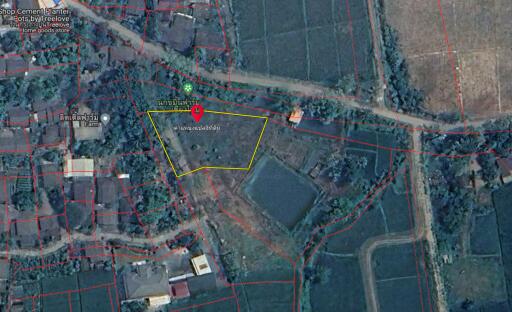 aerial view of a land plot with surrounding areas