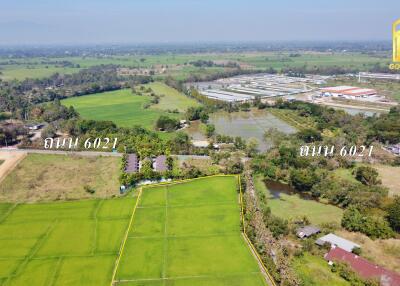 Aerial view of surrounding area and agricultural fields