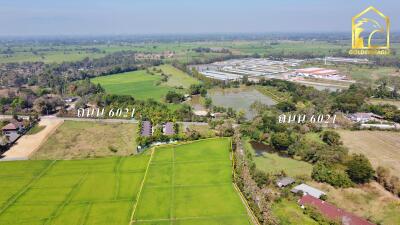 Aerial view of surrounding area and agricultural fields