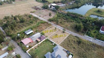 Aerial view of empty land plots for sale with area measurements