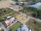 Aerial view of empty land plots for sale with area measurements