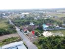 aerial view of a land plot in a suburban area