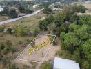 Aerial view of a land plot marked with area measurement