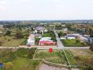 Aerial view of a land plot in a residential neighborhood