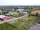 Aerial view of a residential land plot in a suburban area