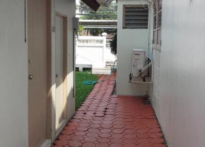 Outdoor pathway alongside the building