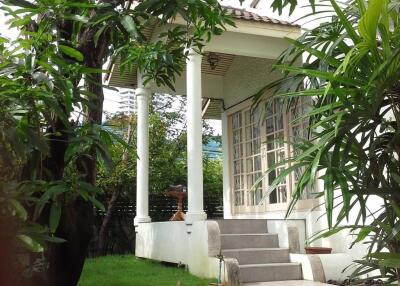 Outdoor view of a residential building with garden