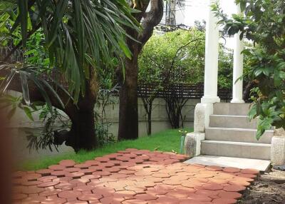 Garden with red brick pathway