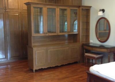 Bedroom with wooden furniture