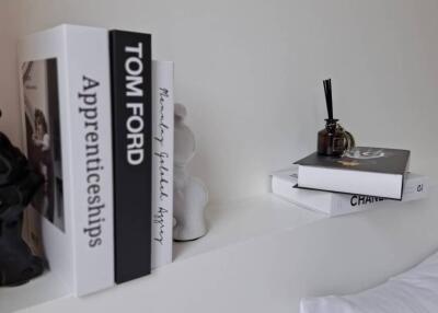 Stylishly decorated shelf with books and decorative items