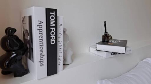 Stylishly decorated shelf with books and decorative items