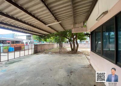 Covered outdoor space with tree view