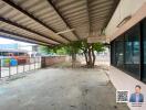 Covered outdoor space with tree view