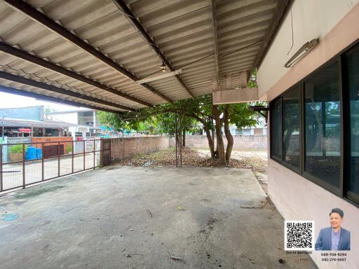 Covered outdoor space with tree view