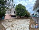 Outdoor area with a paved yard and surrounding buildings