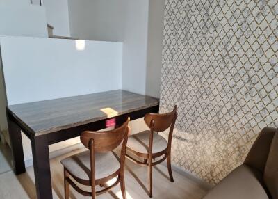 Dining area with table and chairs