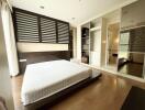 Spacious and modern bedroom with built-in wardrobes