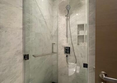 Modern shower area with glass doors