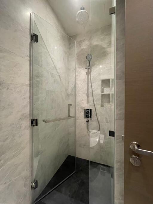 Modern shower area with glass doors