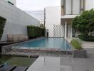 Modern house with a pool and greenery