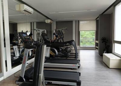 modern apartment gym with treadmill machines