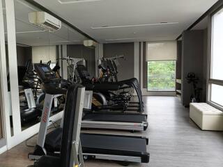 modern apartment gym with treadmill machines