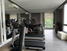 modern apartment gym with treadmill machines