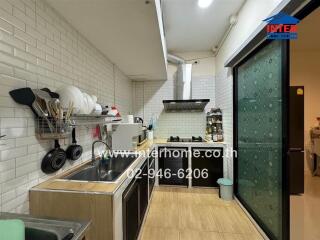 Modern kitchen with appliances and storage