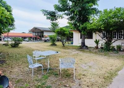 Well-maintained garden with seating area