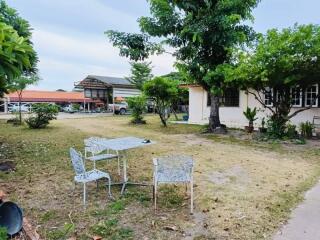 Well-maintained garden with seating area