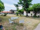 Well-maintained garden with seating area