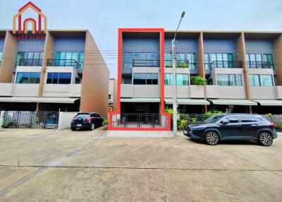 Front view of a modern multi-story townhouse