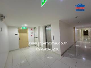 Hallway with elevators and emergency exits