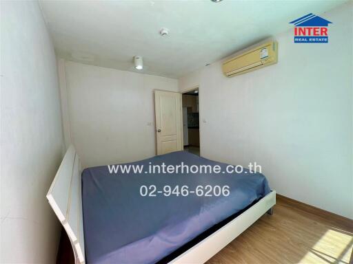 Bedroom with a bed and air conditioning