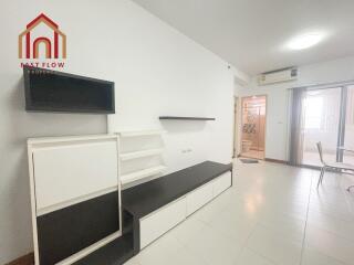 Modern minimalist living room with black and white shelving