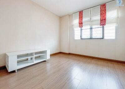 Spacious bedroom with a minimalist design.