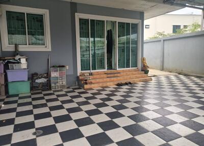 Outdoor patio with checkered flooring