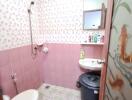 Bathroom with shower, toilet, sink and mirror