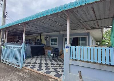 Covered outdoor area with checkered flooring